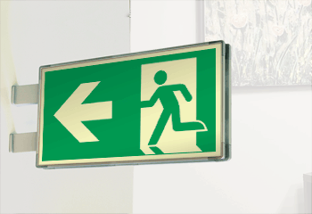 SEMLE715101BN - Segnaletica all. Metal bifacciale luminescente uscita sx EN ISO 7010