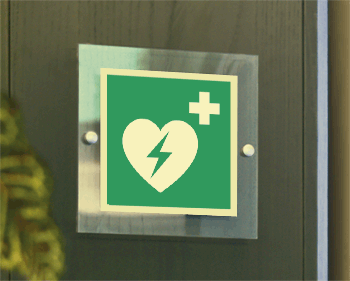 SEPSE15156W - targa Plexi monofacciale Defibrillatore EN ISO 7010 E010
